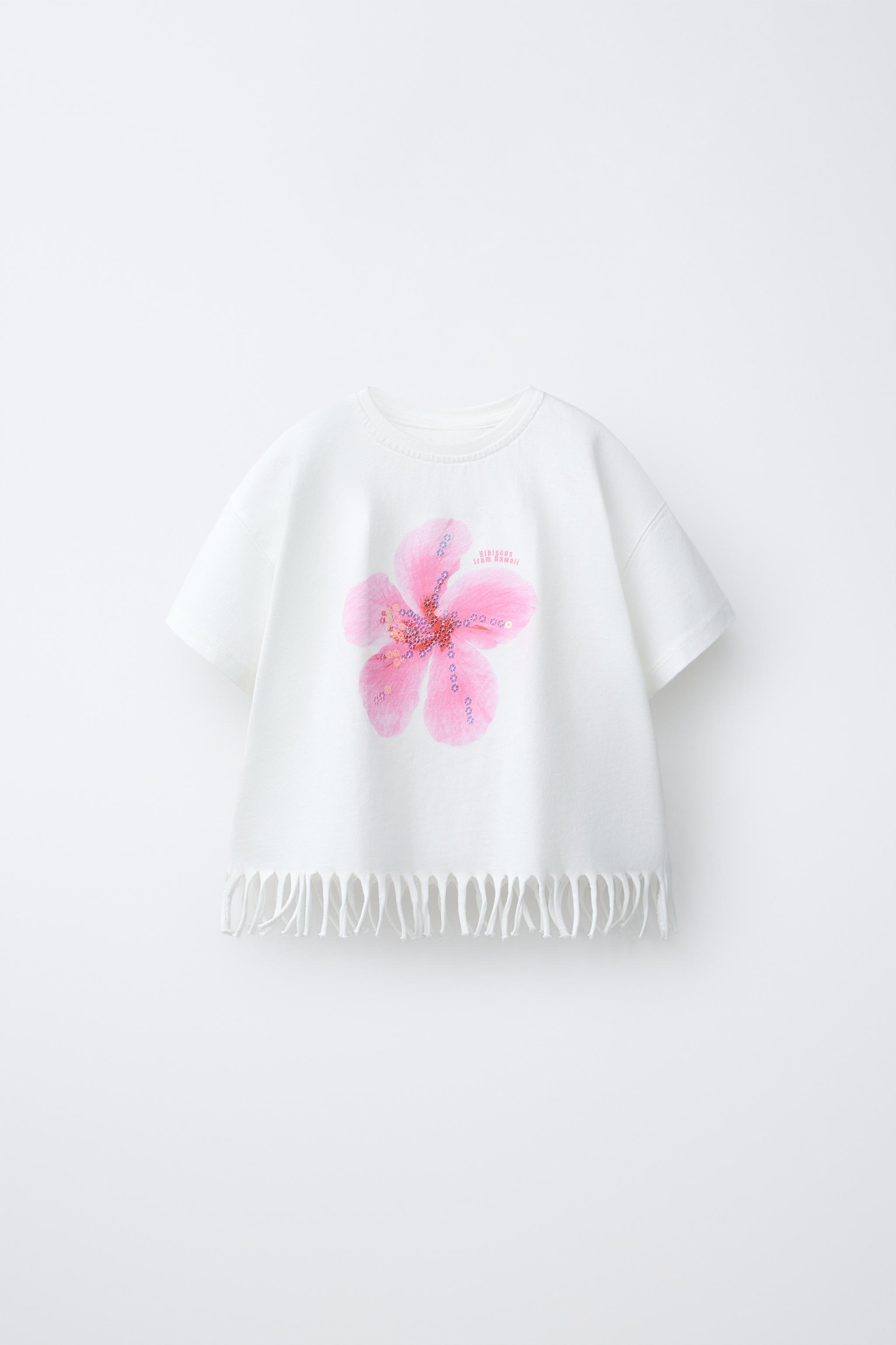 T-SHIRT FLEURI À FRANGES ET PAILLETTES